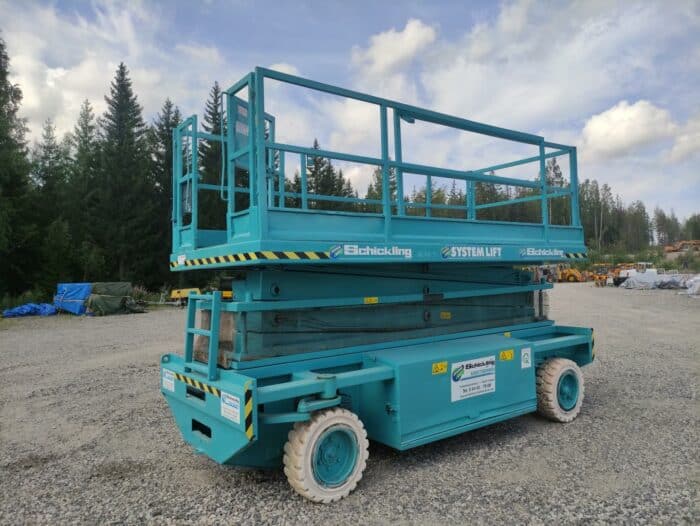 Holland Lift Q-135EL18 akkukäyttöinen saksilavanostin (0679-3)